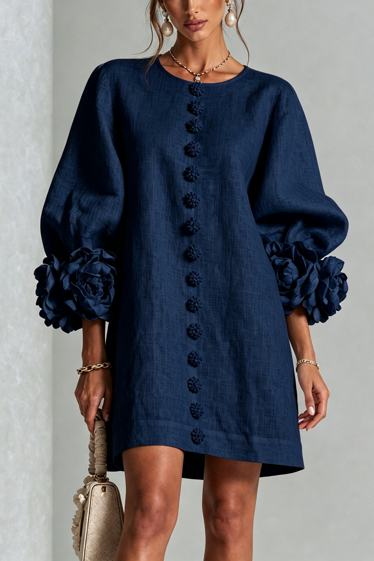 Vestido mini de lino con puños anudados
